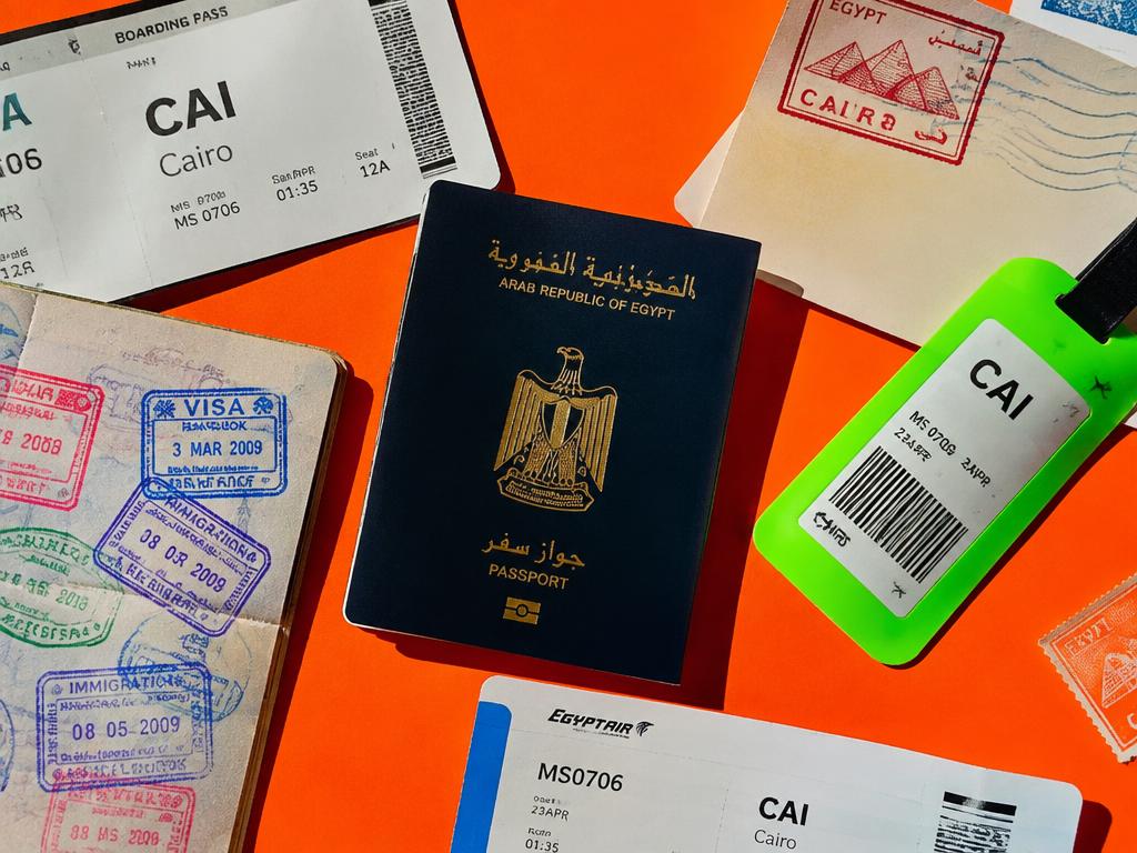 Egyptian passport with visa stamps and boarding passes